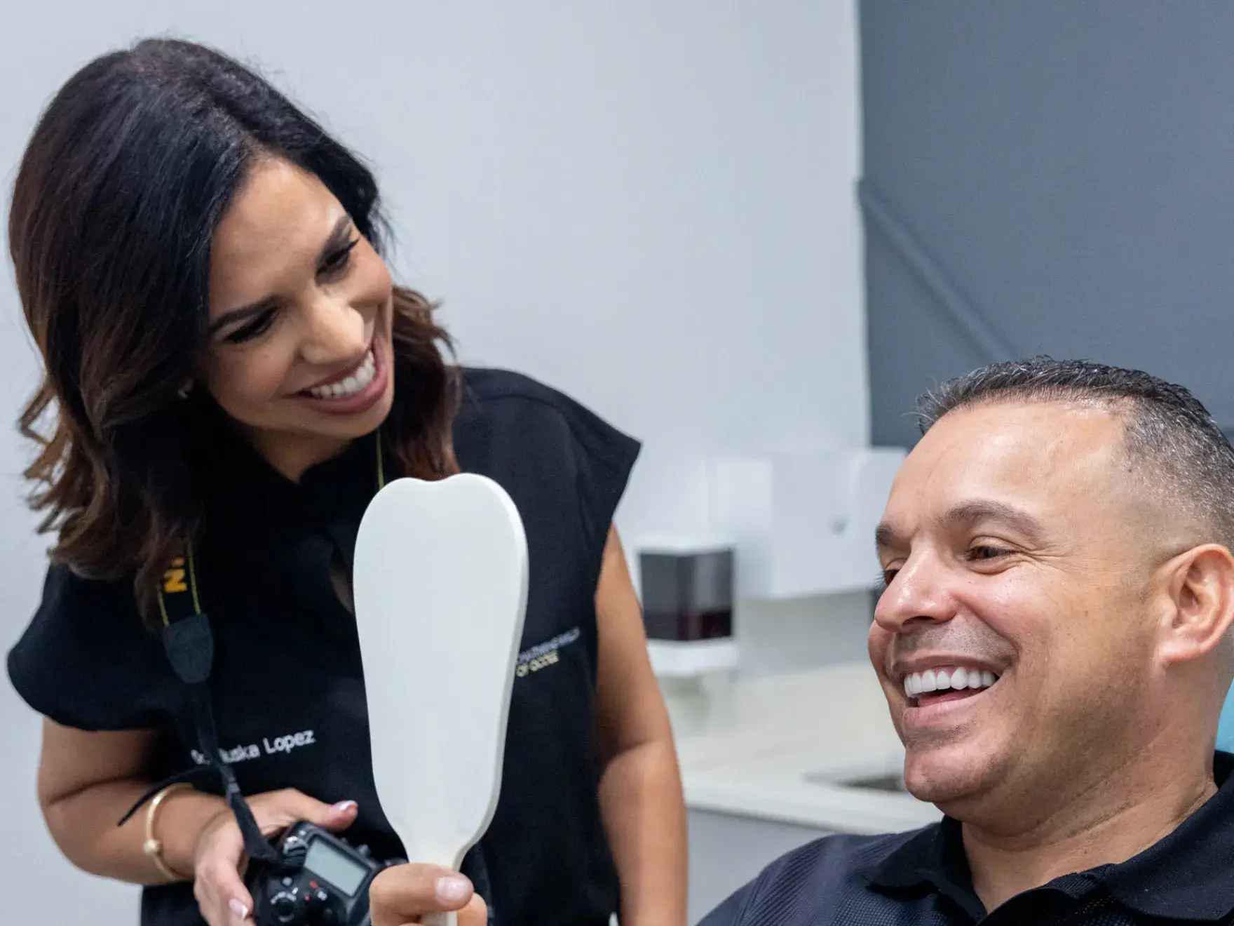 Patient smiling after professional teeth whitening in Ocoee