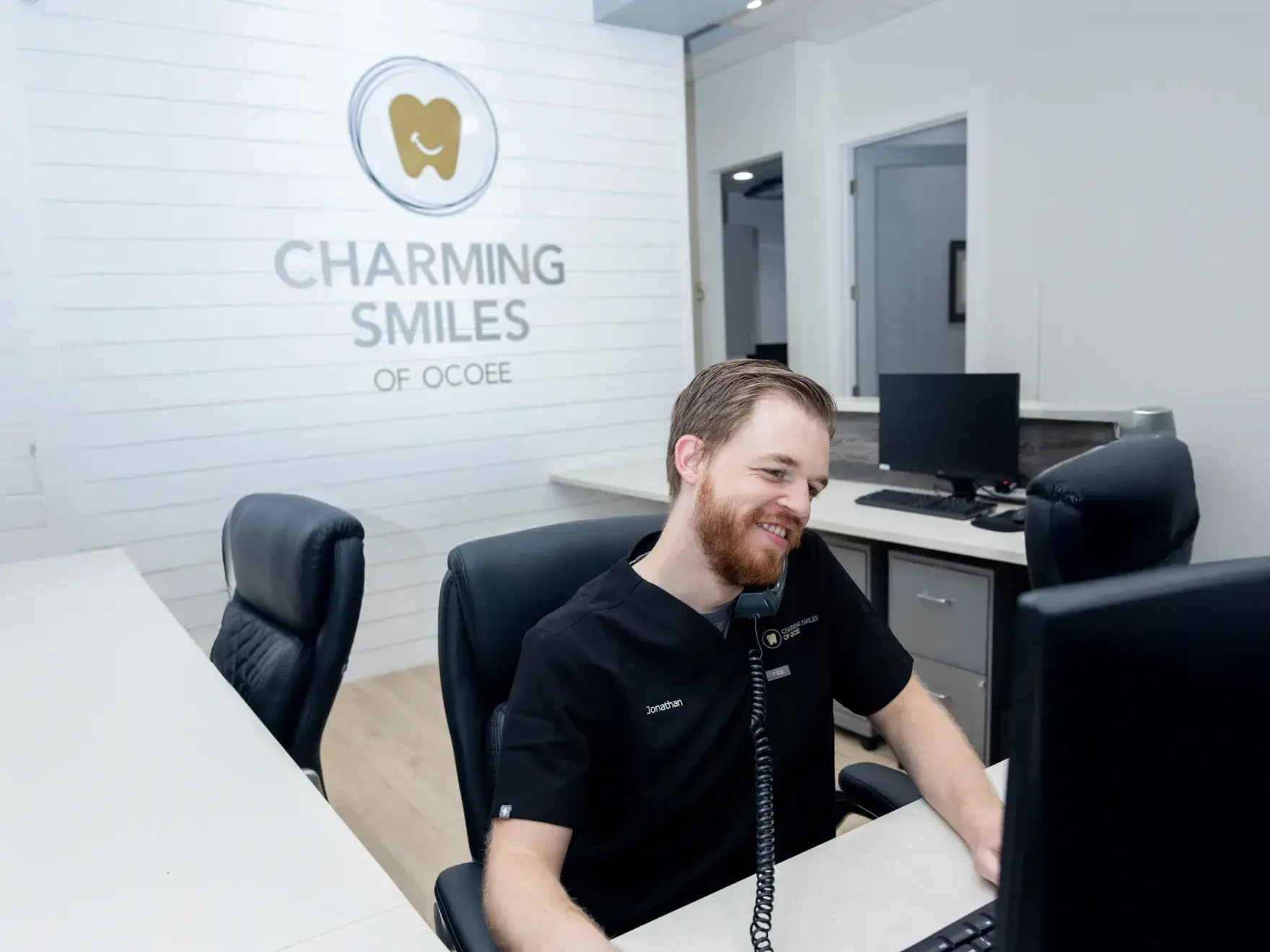 Team member helping a patient schedule a dental appointment